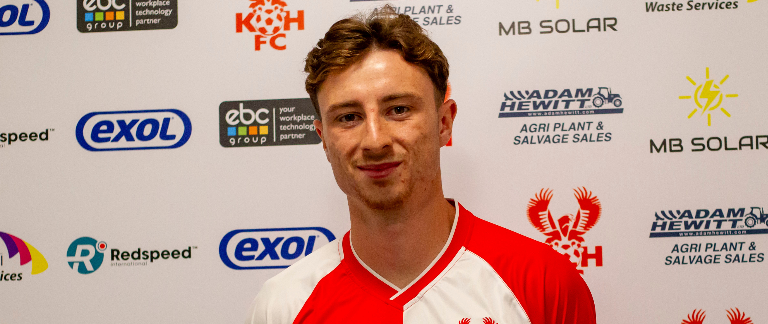 Striker Stewart signs